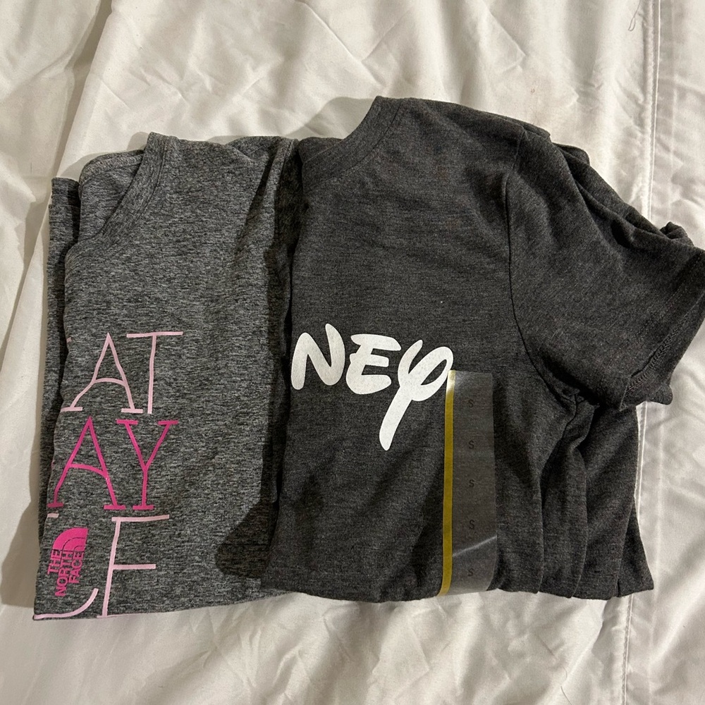The North Face and NWT Disney.  2 t shirts women’s size small.